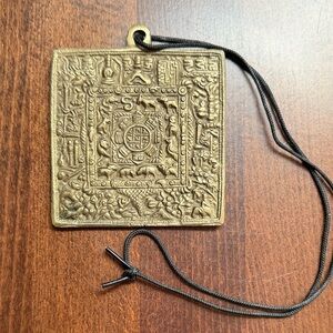 Intricate Gold-Tone Square Pendant
